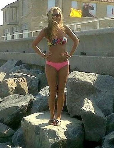 Emily Osment In A Bikini photo 13