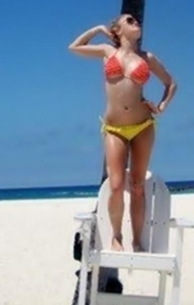 Emily Osment In A Bikini photo 24